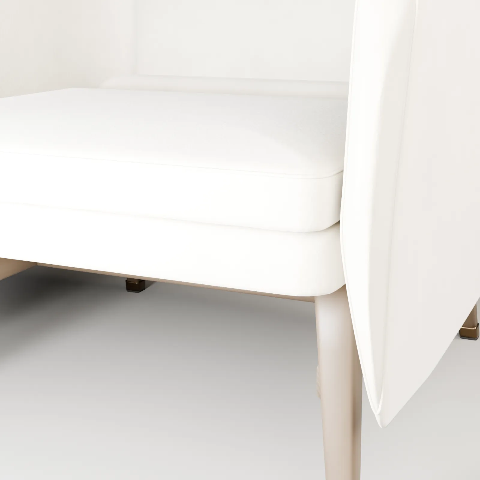 Construction close-up of the VELA seat edge, smoked-ash leg, timber rail, and satin bronze ferrule.